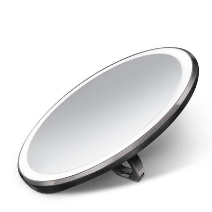 simplehuman Sensor Mirror, Lighted Compact Makeup Magnifying Mirror with Light, Round, Travel Size, Black Stainless Steel