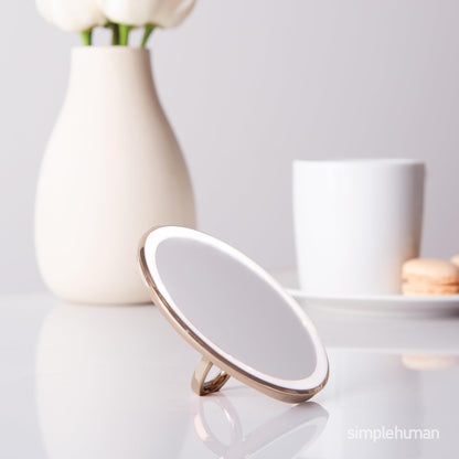 simplehuman Sensor Mirror, Lighted Compact Makeup Magnifying Mirror with Light, Round, Travel Size, Black Stainless Steel