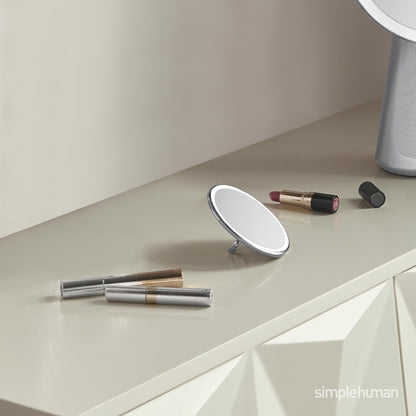 simplehuman Sensor Mirror, Lighted Compact Makeup Magnifying Mirror with Light, Round, Travel Size, Black Stainless Steel